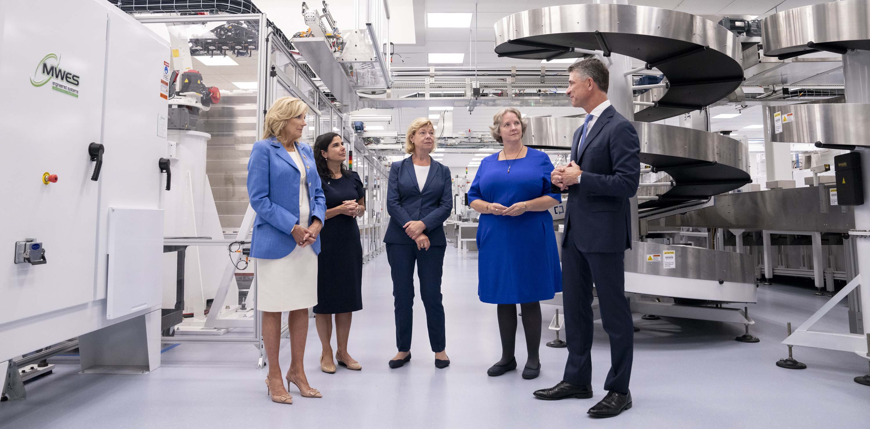 CEO Kevin Conroy, first lady Jill Biden and others tour a lab