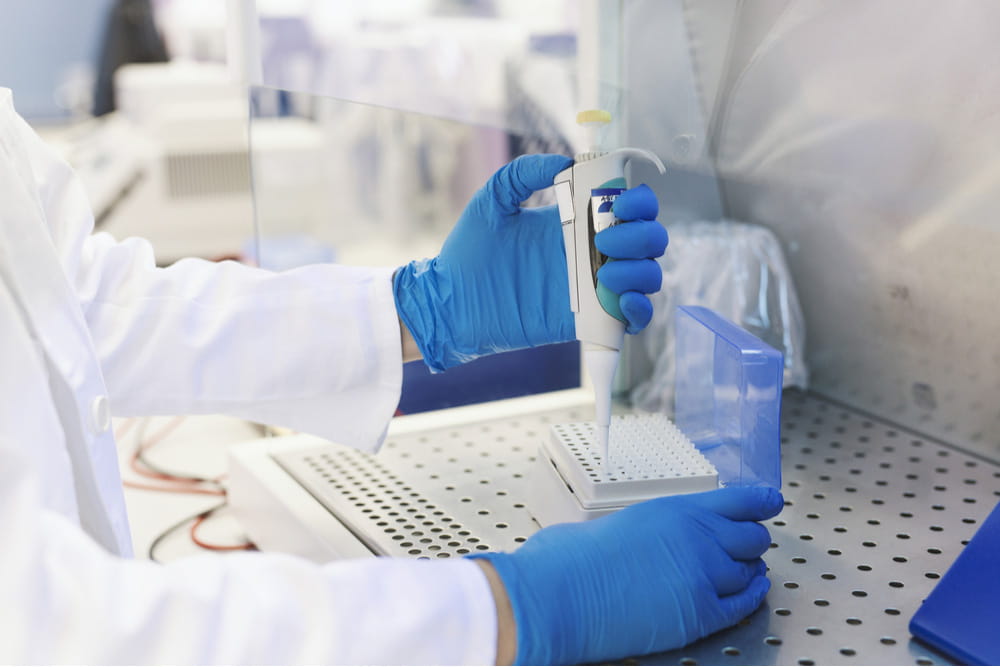 Image of a researcher pipetting 